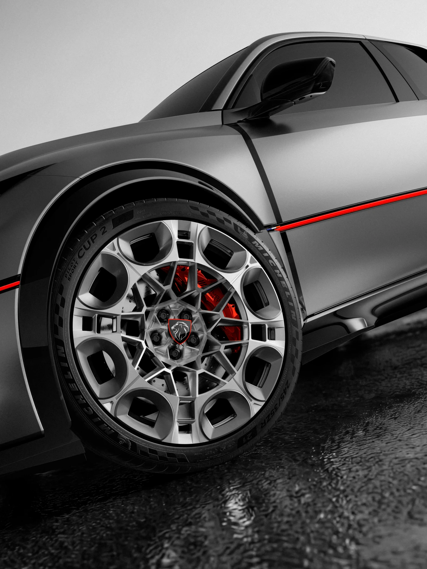 De PEUGEOT E-T16 Concept in de kleur mat Winchestergrijs, geaccentueerd met rode lijnen.